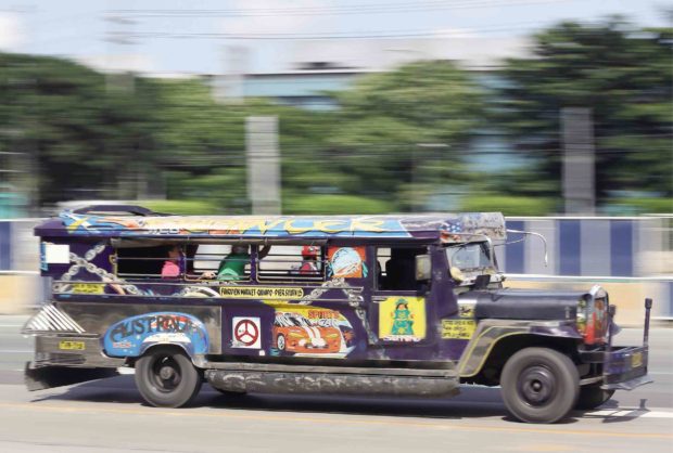 BACK AT P9 Jeepney drivers and passengers will have to adjust to the new rate again. —NIÑO JESUS ORBETA