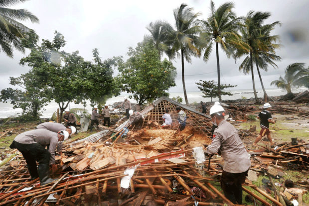 Tsunami survivors face another whammy as floodwater swamps homes