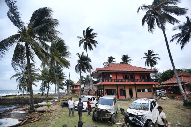 Rise again: Tsunami survivors open shop, hotels amid rubble