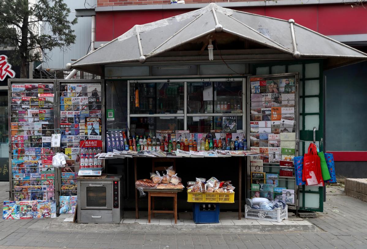 In Beijing newsstands face battle amid changing times 