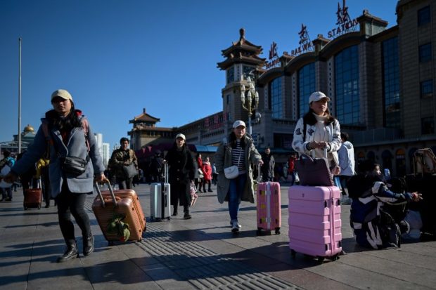 Chinese begin Lunar holiday exodus in the millions