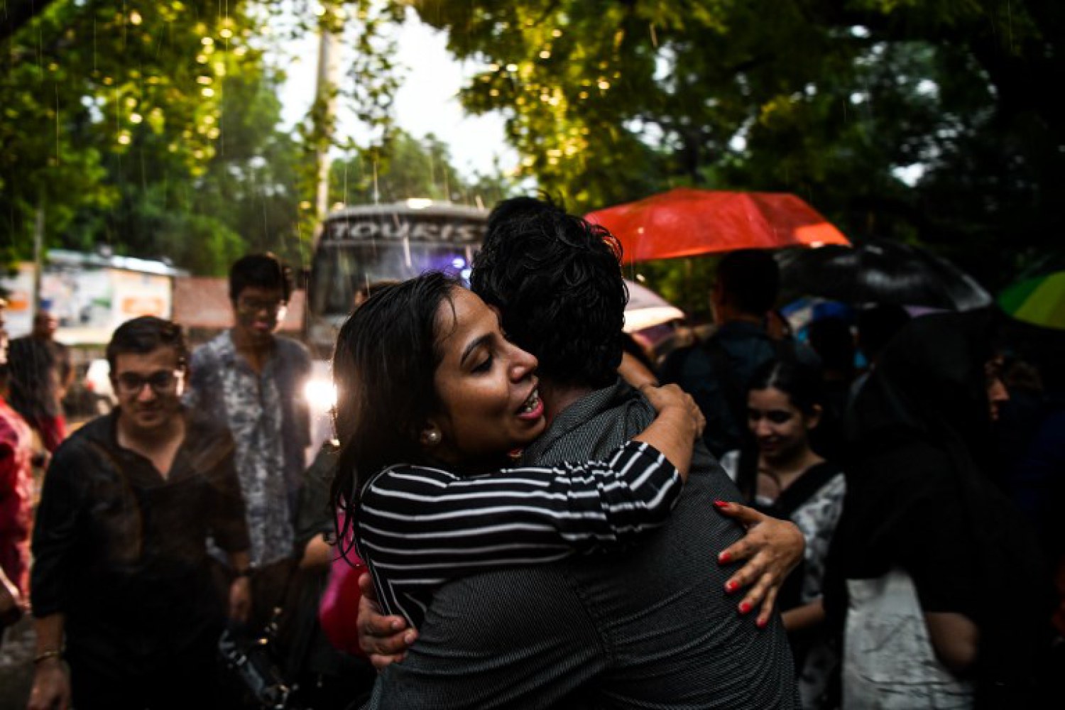 Indian members and supporters of the lesbian, gay, bisexual, transgender (LGBT) community celebrate the Supreme Court decision to strike down a colonial-era ban on gay sex, during heavy rainfall in New Delhi on September 6, 2018.
