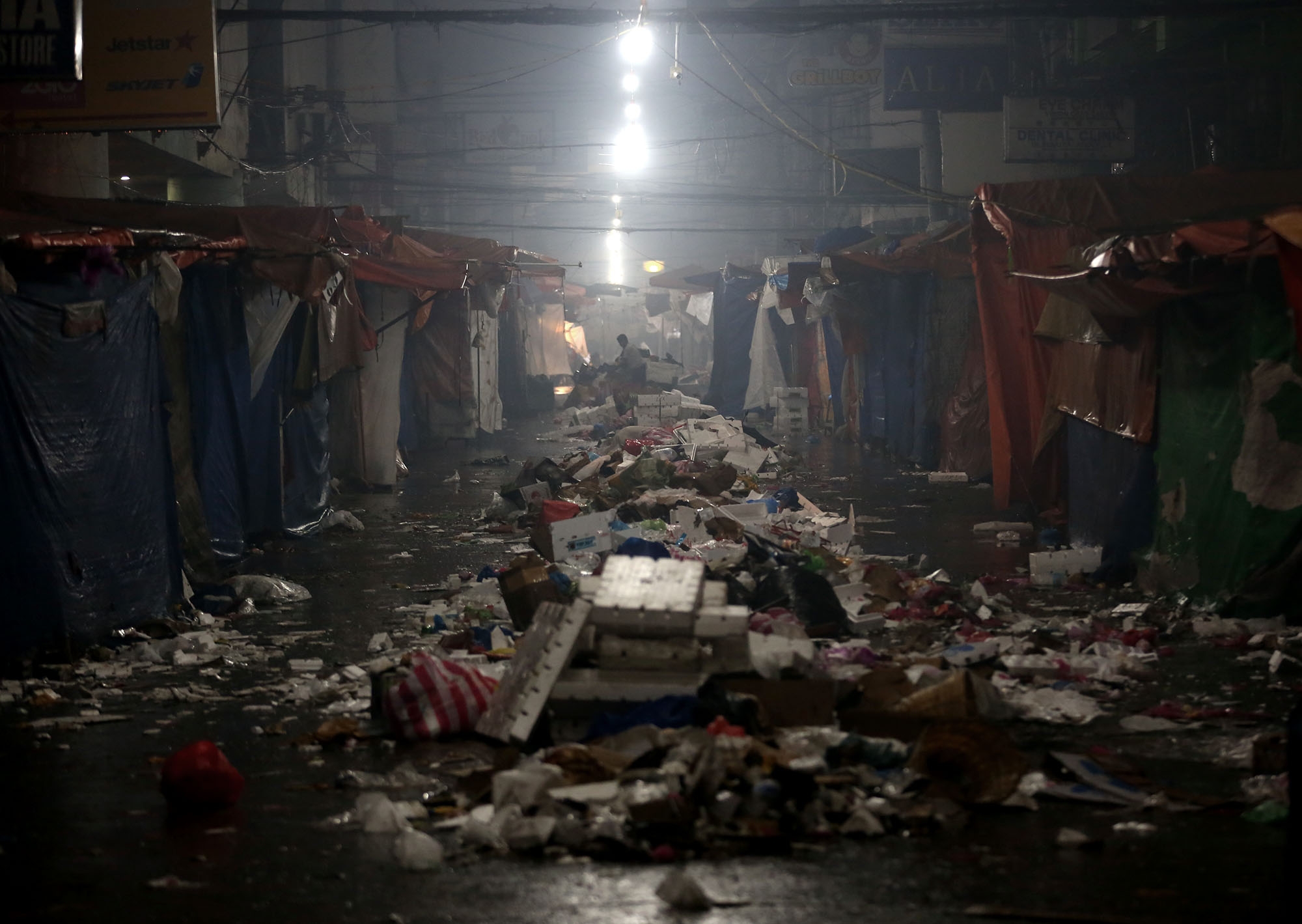 MESSY START Carriedo Street in Quiapo, Manila, is covered with trash on the first day of the year. —RICHARD REYES