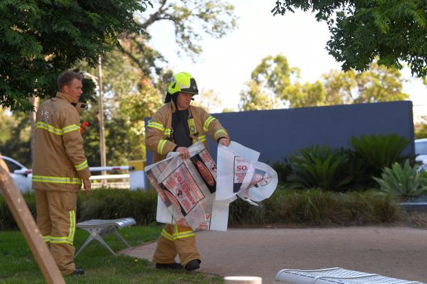 Firefighter with hazardous material bag in Melbourne