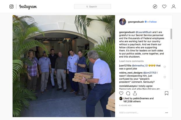 George W. Bush with pizza for Secret Service