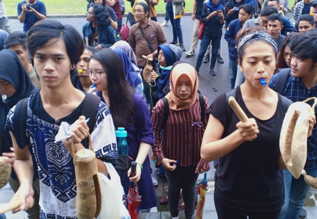 Gadjah Mada University students rally at the campus' central office, demanding justice for Agni, the pseudonym of an alleged sexual assault victim, on Nov. 29. The Jakarta Post/Asia News Network/Bambang Muryanto
