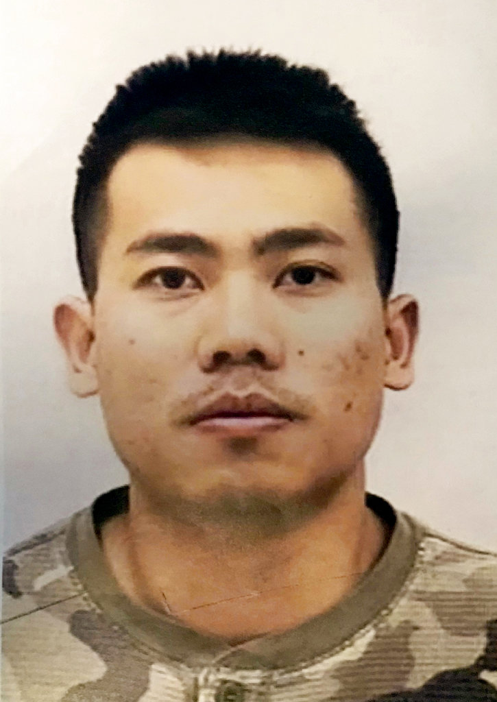 Soldier charged with murder after wife's body found in trash