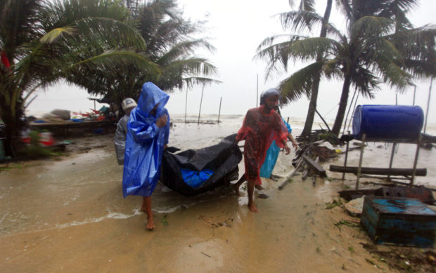 Tropical storm's rain, surging seas strike Thai beaches