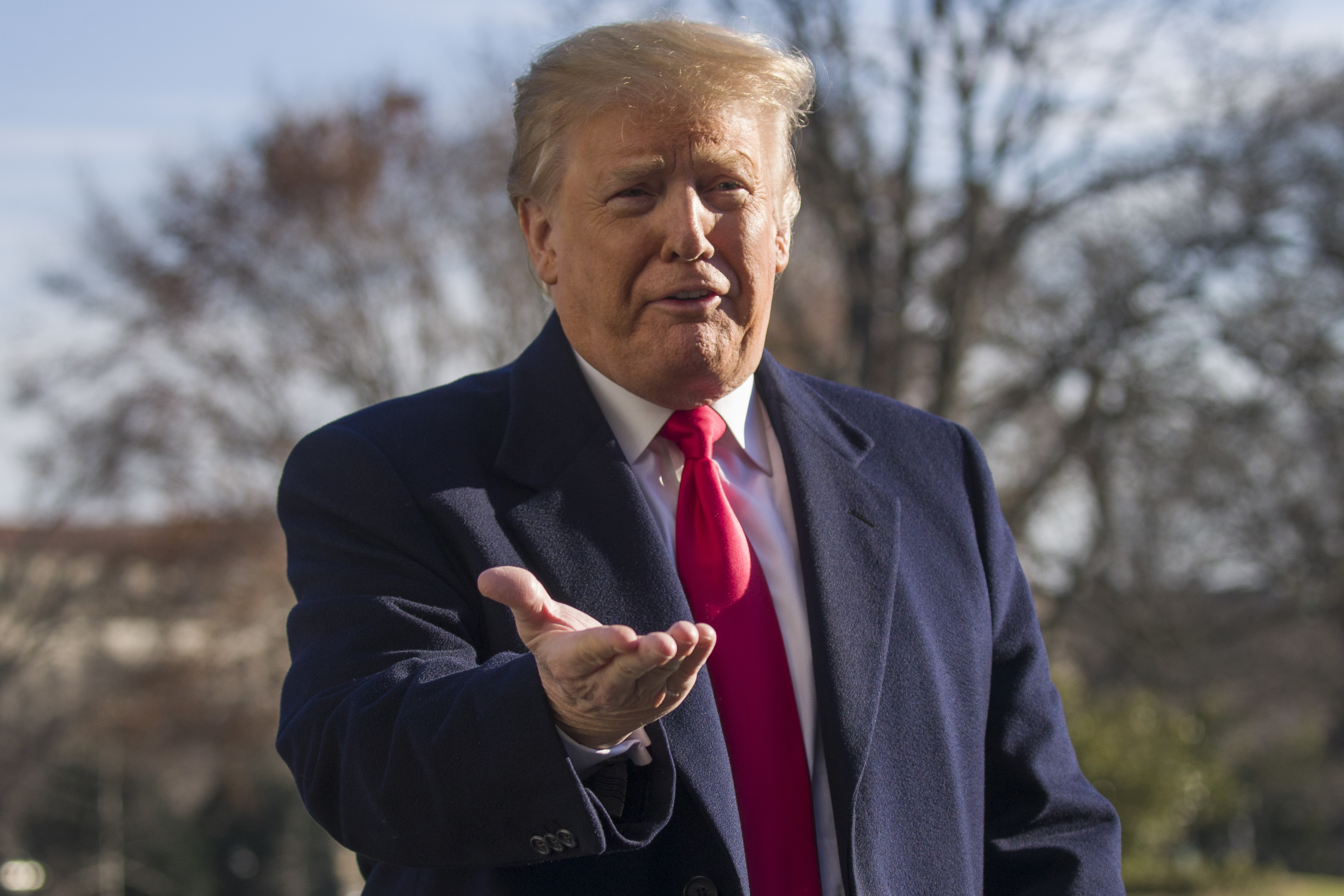 AP FACT CHECK: Do ex-presidents back Trump wall? They say no