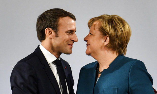 Germany, France renew friendship treaty, warn of nationalism