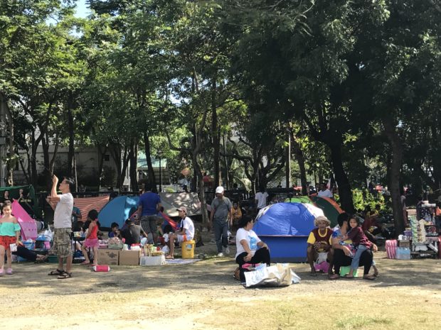 LOOK: Devotees set up tents at Quirino Grandstand for Traslacion 2019
