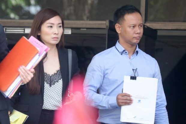 Singapore couple convicted of abusing maid who was ordered to pour hot water on herself