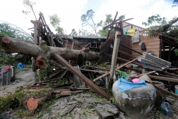 Scenes of destruction wreaked by tropical storm Pabuk, like this damaged house in Ban Chang-hoon of Nakhon Si Thammarat’s Muang district, are a common sight throughout the province a day after the storm’s exit.