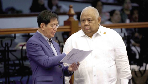 SCRUTINY Sen. Panfilo Lacson discusses with Executive Secretary Salvador Medialdea the fiscal year 2019 national budget awaiting approval by the Senate.—INQUIRER PHOTO