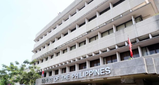 A rather serious public hearing at the Senate of the Philippines was briefly disrupted by a loud blow after the Senate seal fell.