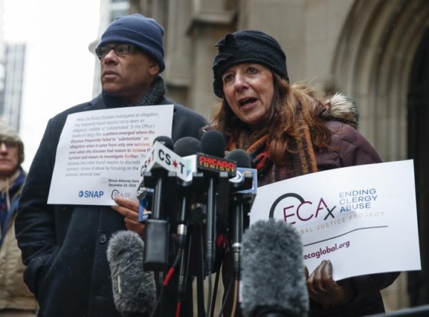 Patricia Gallagher Marchant (R), a victim of clergy abuse, speaks during a press conference outside the Archdiocese of Chicago on January 2, 2019 in Chicago, Illinois. - Advocates for clergy abuse victims demanded inclusion in a historic Vatican conference to address the crisis, as US bishops gathered in prayer near Chicago in advance of the February meeting. The groups Ending Clergy Abuse (ECA) and Survivors Network of those Abused by Priests (SNAP) said they had sent an open letter to Pope Francis asking to be included in discussing reforms in the Catholic Church. (Photo by KAMIL KRZACZYNSKI / AFP)