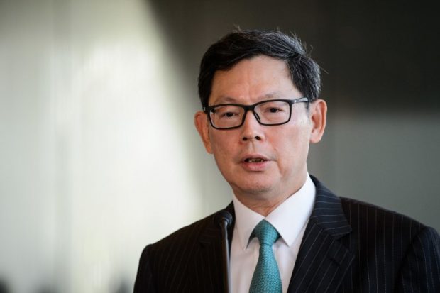 Hong Kong's monetary chief to step down after decade in post