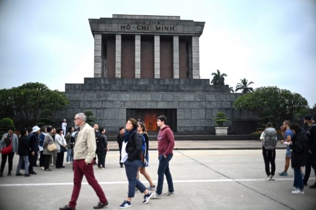 Tourist visit the Ho Chi Minh Mausoleum in Hanoi on February 25, 2019, ahead of the second US-North Korea summit. - US President Donald Trump and North Korean leader Kim Jong Un meet in Hanoi this week, faced with putting meat on the bones of the vaguely worded declaration that emerged from their historic first summit in Singapore. (Photo by Jewel SAMAD / AFP)