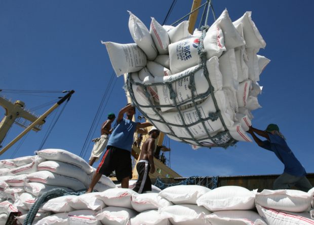 Unloading rice from a ship