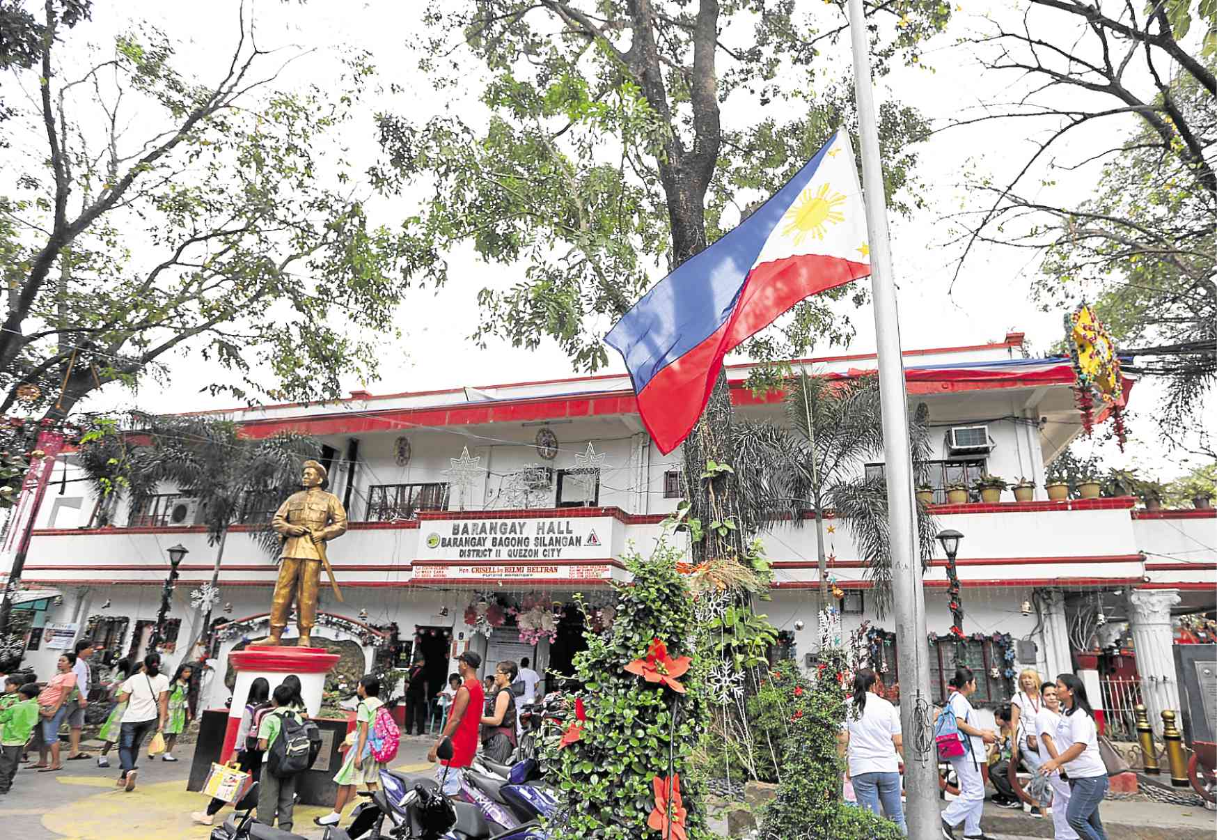QC officials clash over motive in killing of village chair