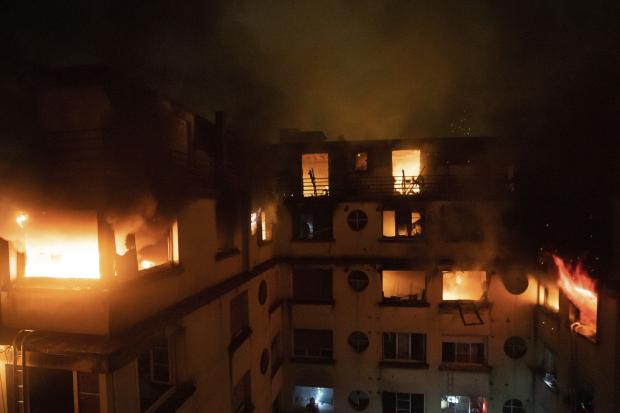 Paris apartment fire death toll up to 10; arson suspected