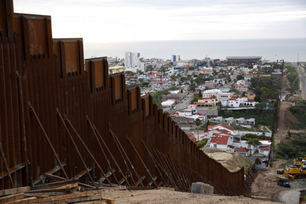 New US-Mexico border barrier charts tricky course near homes