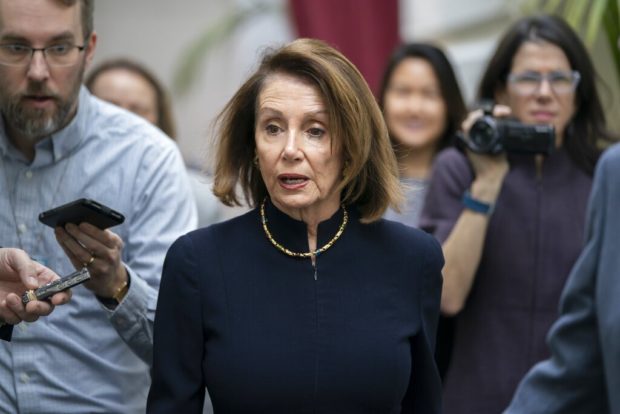 Pelosi waves off Trump impeachment, says it would divide country
