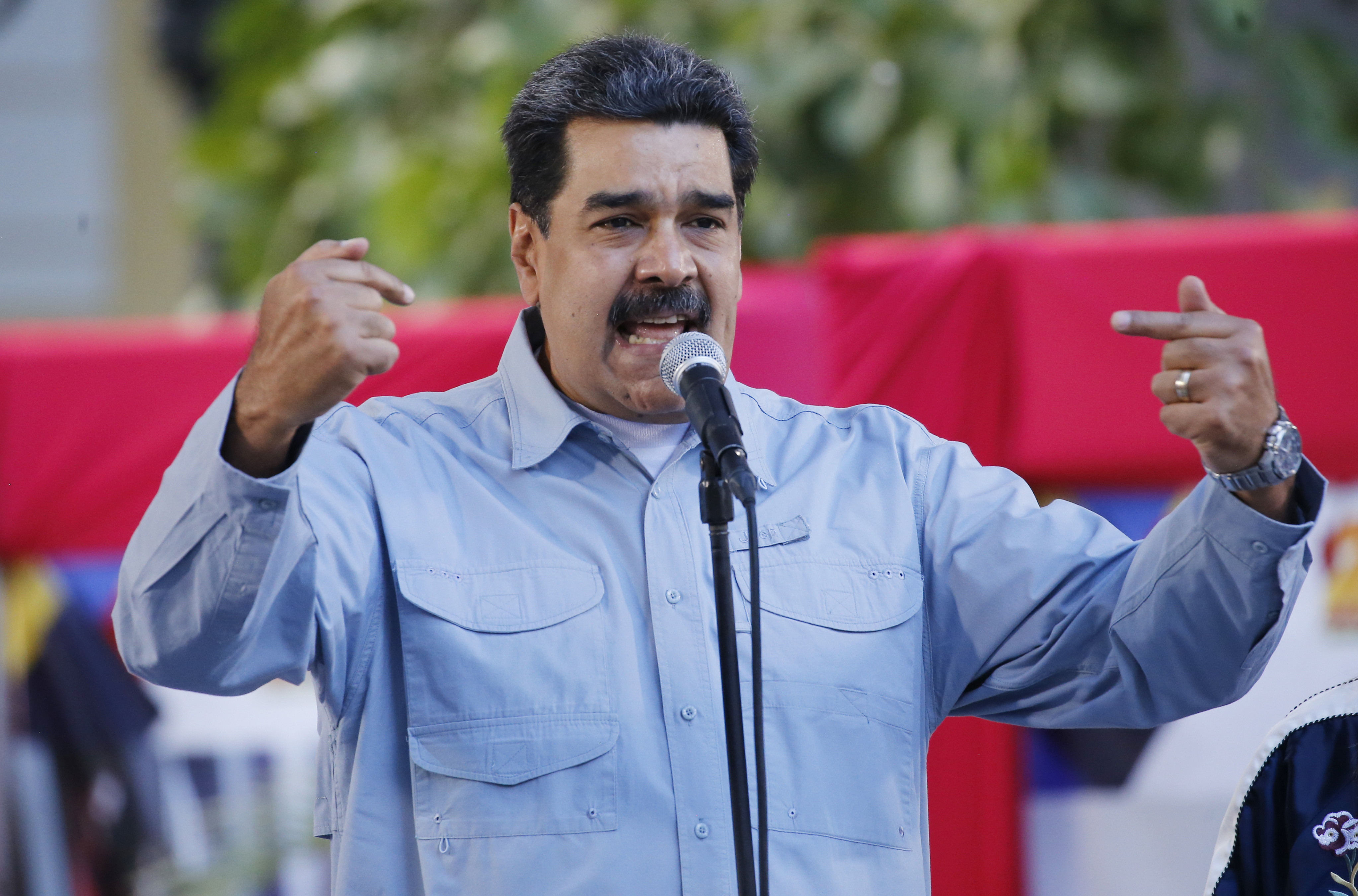 Maduro rallies military as Venezuela opposition appeals to troops