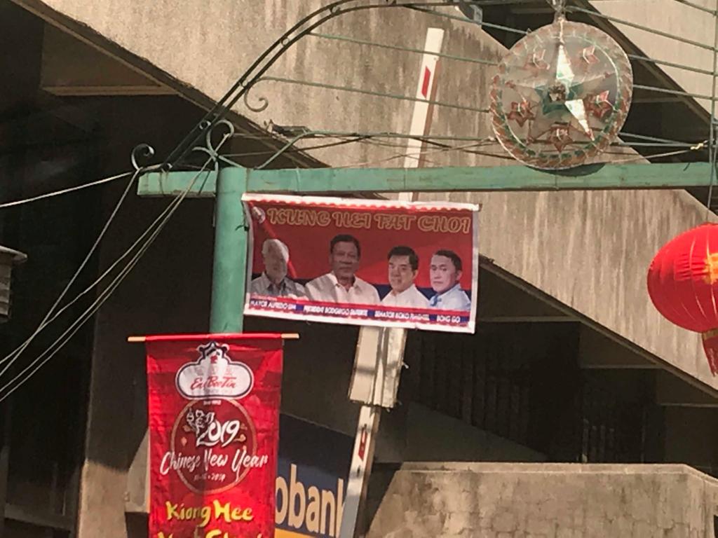 LOOK: Local, national pols place tarps in Binondo on Chinese New Year