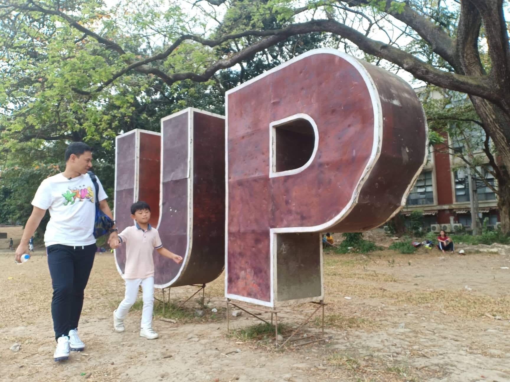 Angara bonding with son at UP