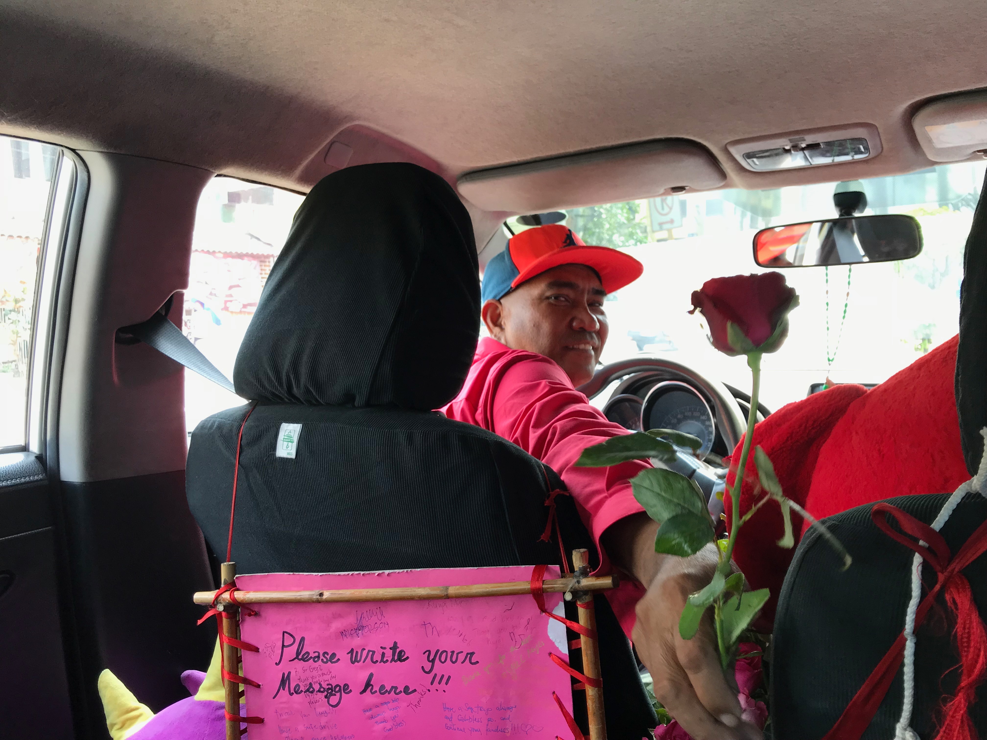Cabbie makes sure his passengers get to smell the roses