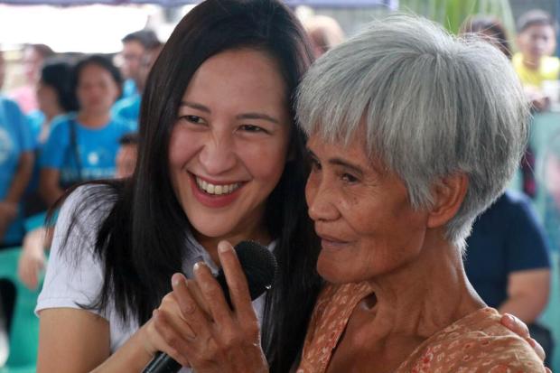 oy Belmonte with a QC resident