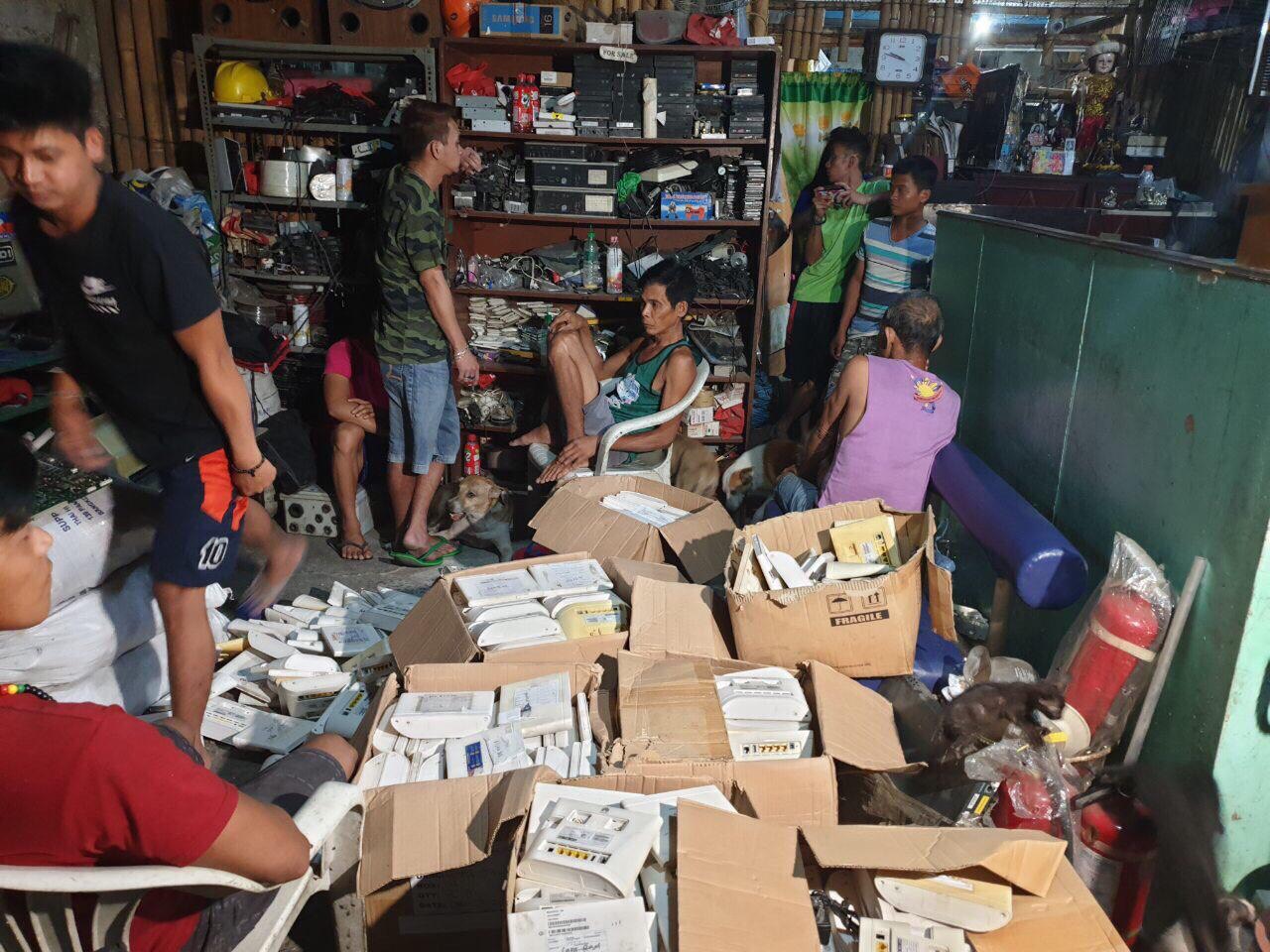 Makati cops nab 9 in illegal sale of LTE modems in Quezon City
