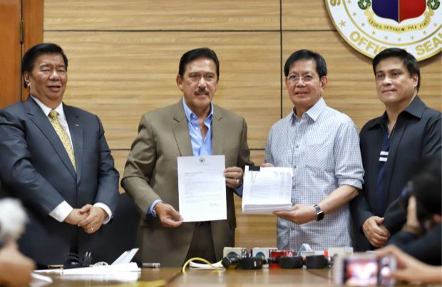 Sotto signs budget, seeks Duterte veto of House changes