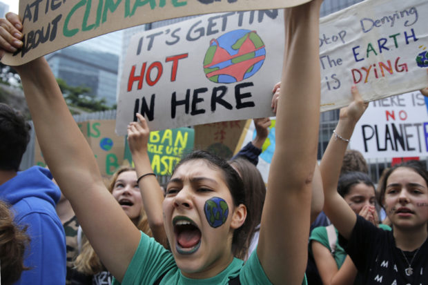 Students worldwide skip class to demand action on climate