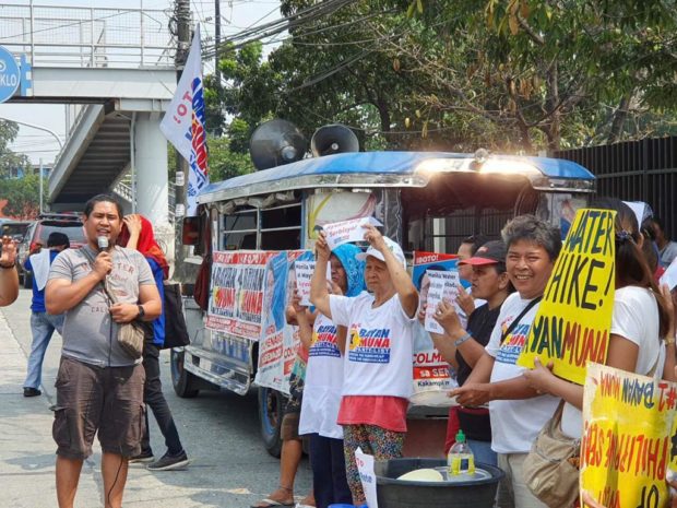 LOOK: Bayan Muna slams Manila Water for service interruptions