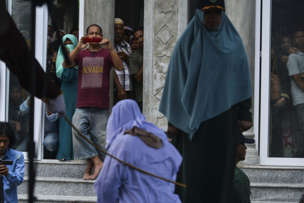 Indonesia's Aceh whips amorous unmarried couples