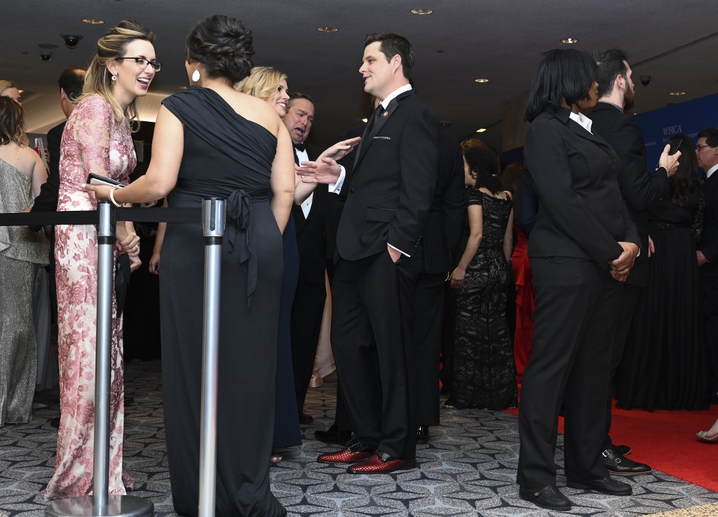 US Representative Matt Gaetz (C) (R-FL) speaks with guests near the red carpet during the White House Correspondents' Dinner in Washington, DC on April 27, 2019. (Photo by ANDREW CABALLERO-REYNOLDS / AFP)
