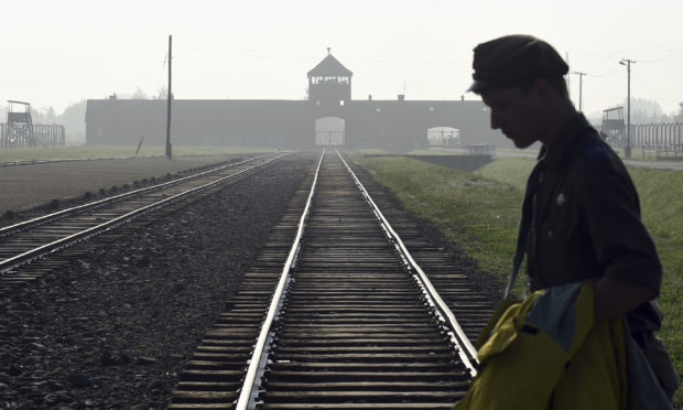 Man charged for trying to steal item from Auschwitz