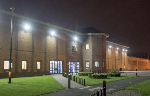 This photo, taken Sept. 4, 2015 shows a general view of HMP Belmarsh, in London. WikiLeaks founder Julian Assange has exchanged a small room at the Ecuadorian Embassy in central London for a cell at Belmarsh Prison, a grim facility in southeast London after his arrest on Thursday, April 11, 2019. (Photo by ANTHONY DEVLIN / PA via AP)