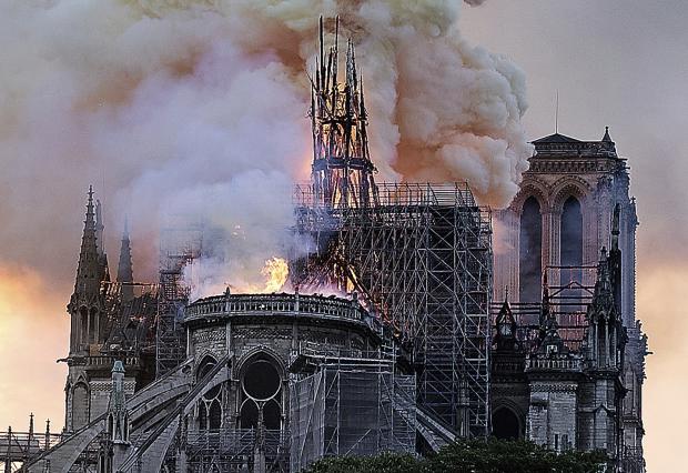 Notred Dame Cathedral in smoke and flames