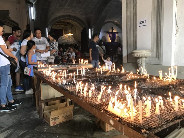 LOOK: Pilgrims flock to San Agustin Church, Manila Cathedral on Good Friday