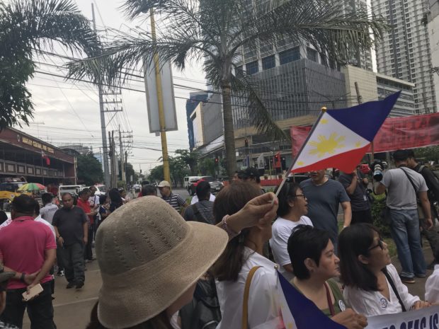 LOOK: Protesters prepare to march toward Chinese Embassy