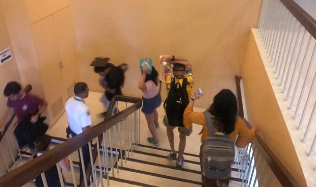 UP students go down stairs during quake