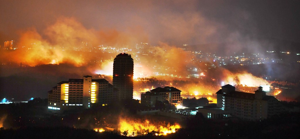 Seoul declares national disaster as winds fan giant forest fire