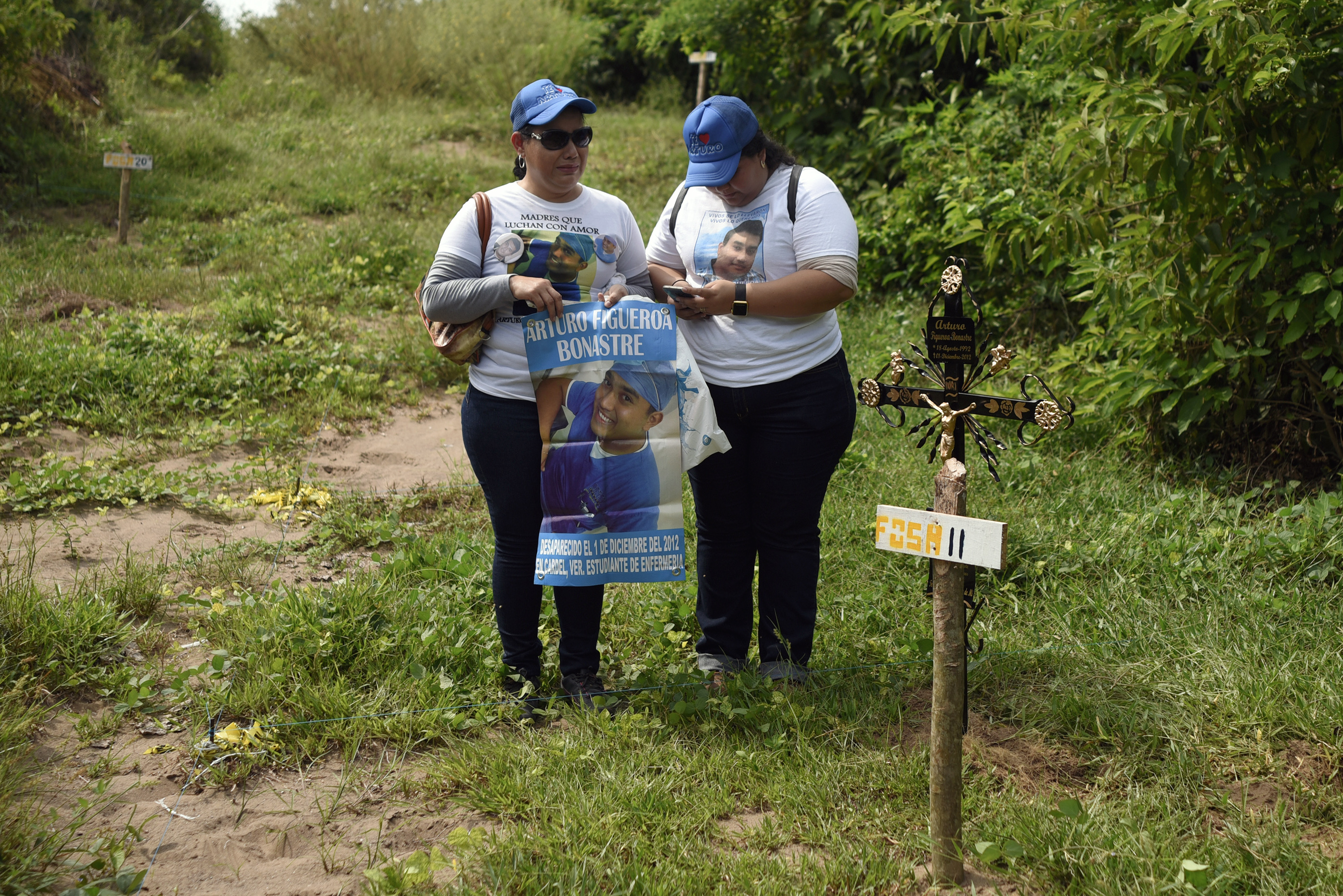 In Mexico, 35 bodies found in mass graves