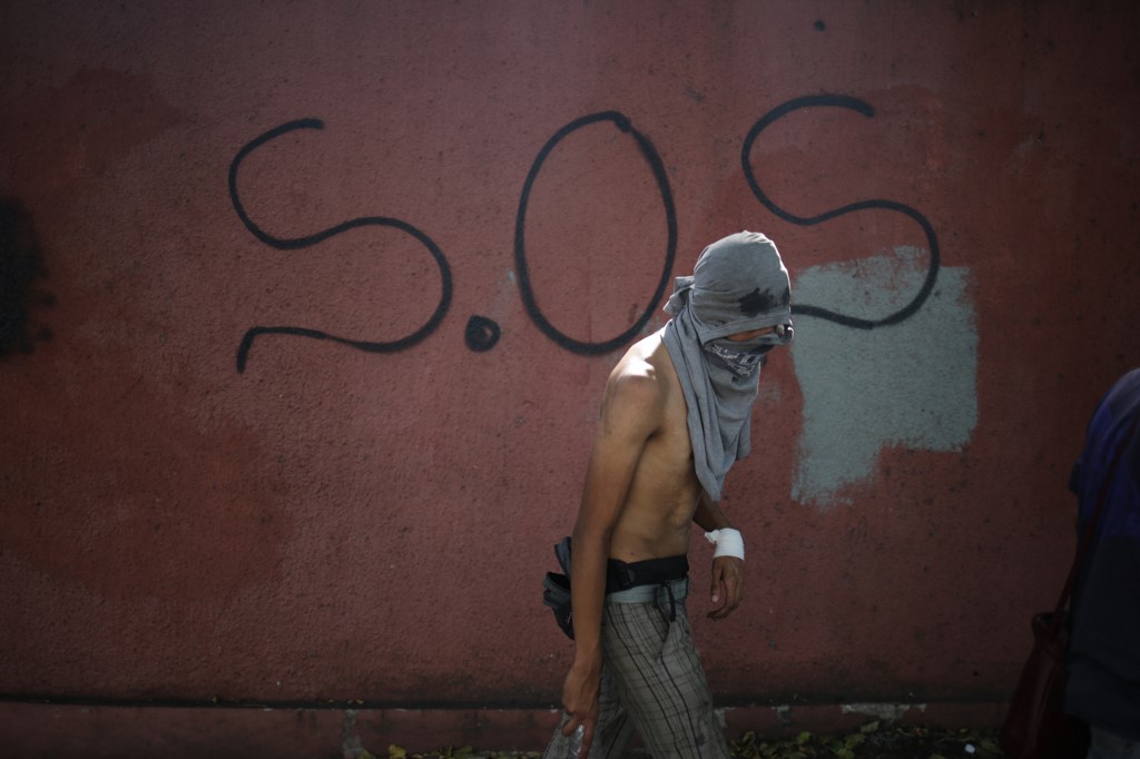 Rage, hope as some Venezuelan soldiers join anti-Maduro protests