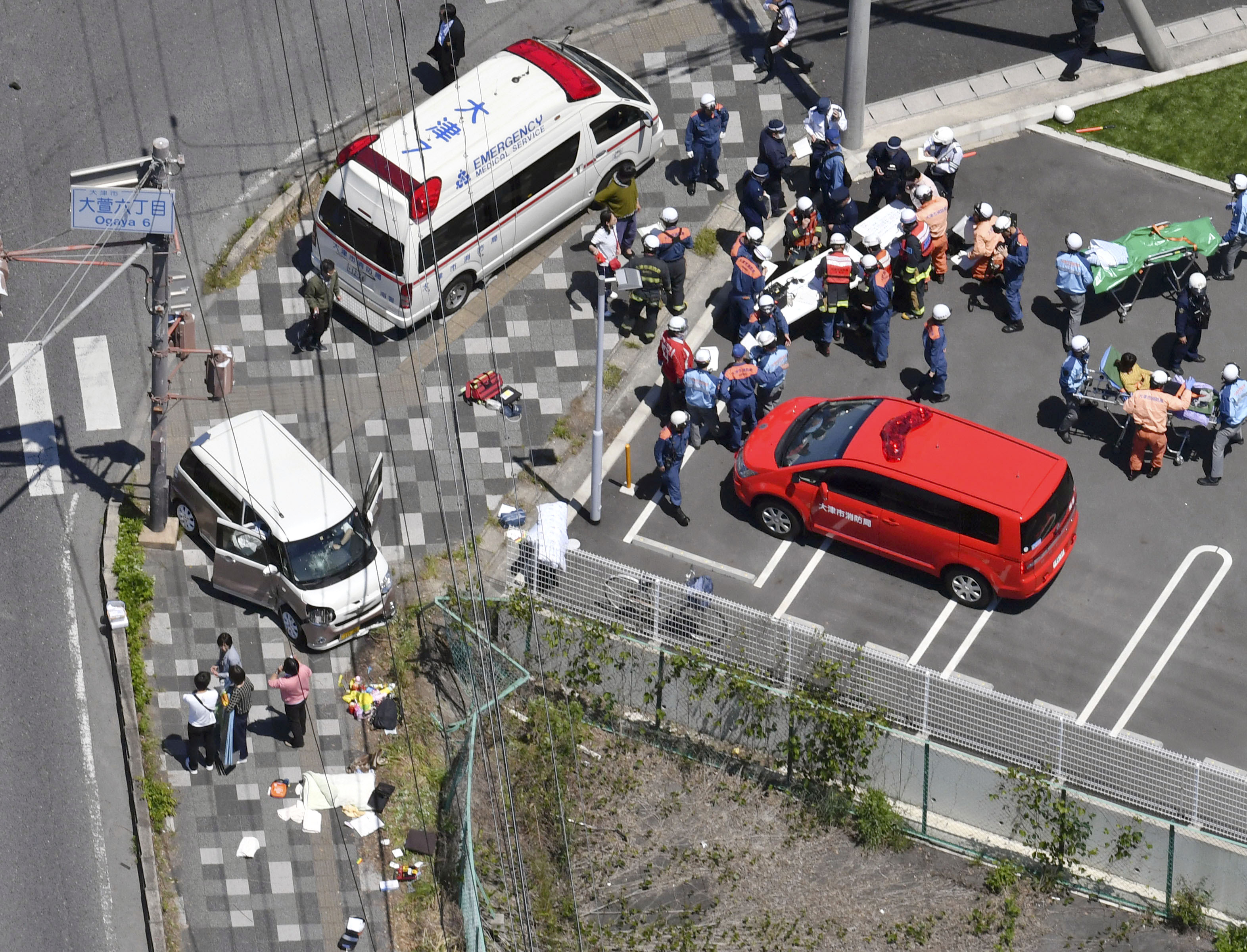 Car hits 13 children, kills 2 in western Japan