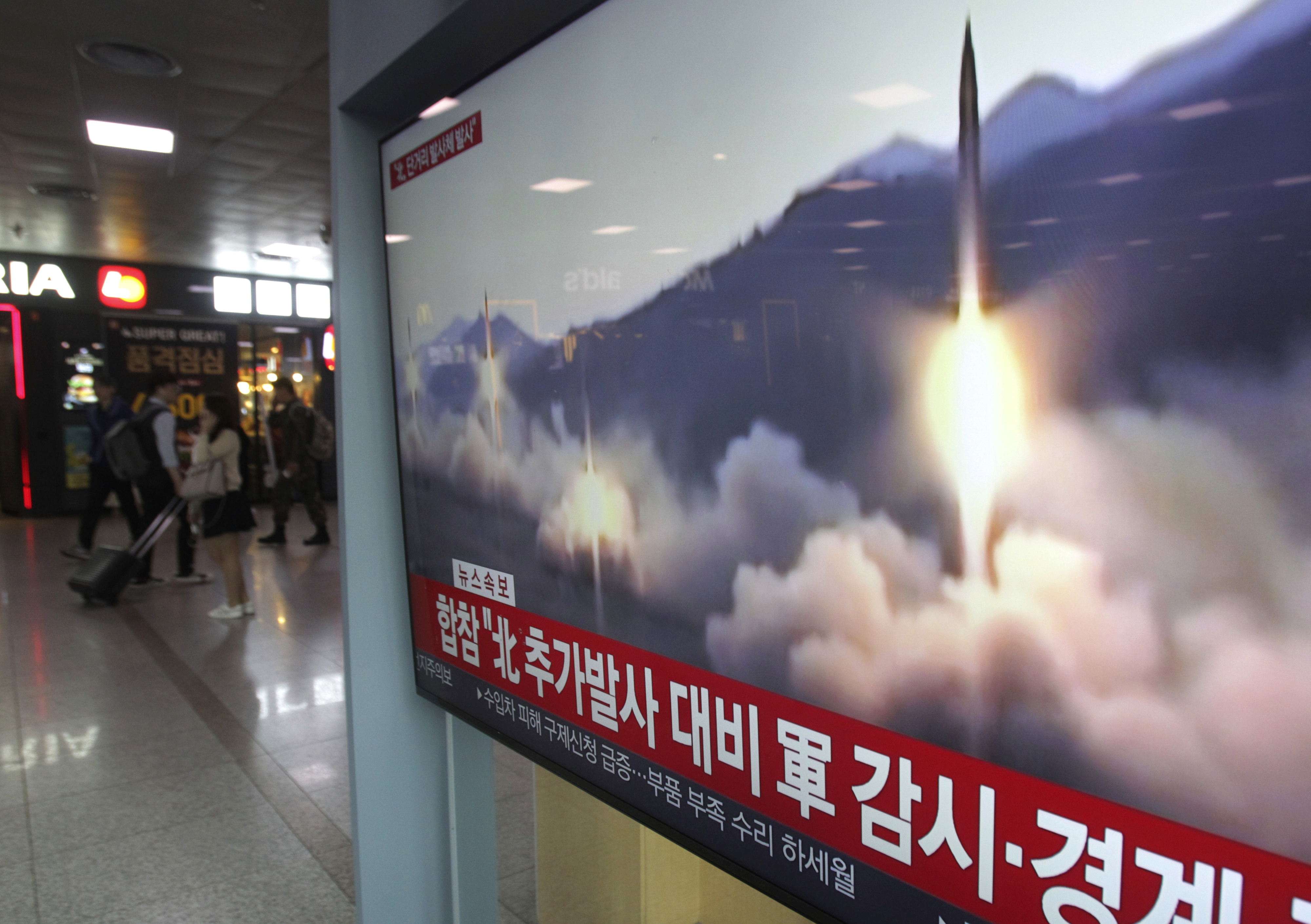 North Korea fires 2 suspected missiles in possible new warning