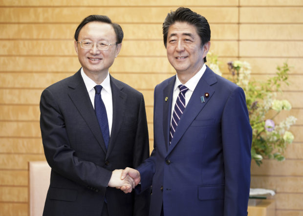 Japan, China agree to boost relations ahead of Xi visit
